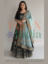 Woman wearing a traditional outfit with a brand logo in the background