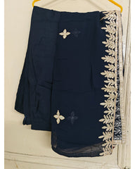 Navy blue dupatta with white floral embroidery on a hanger against a white background