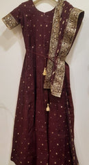 Brown traditional outfit with gold embroidery on a white background