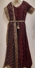 Brown dress with gold embroidery on a plain background