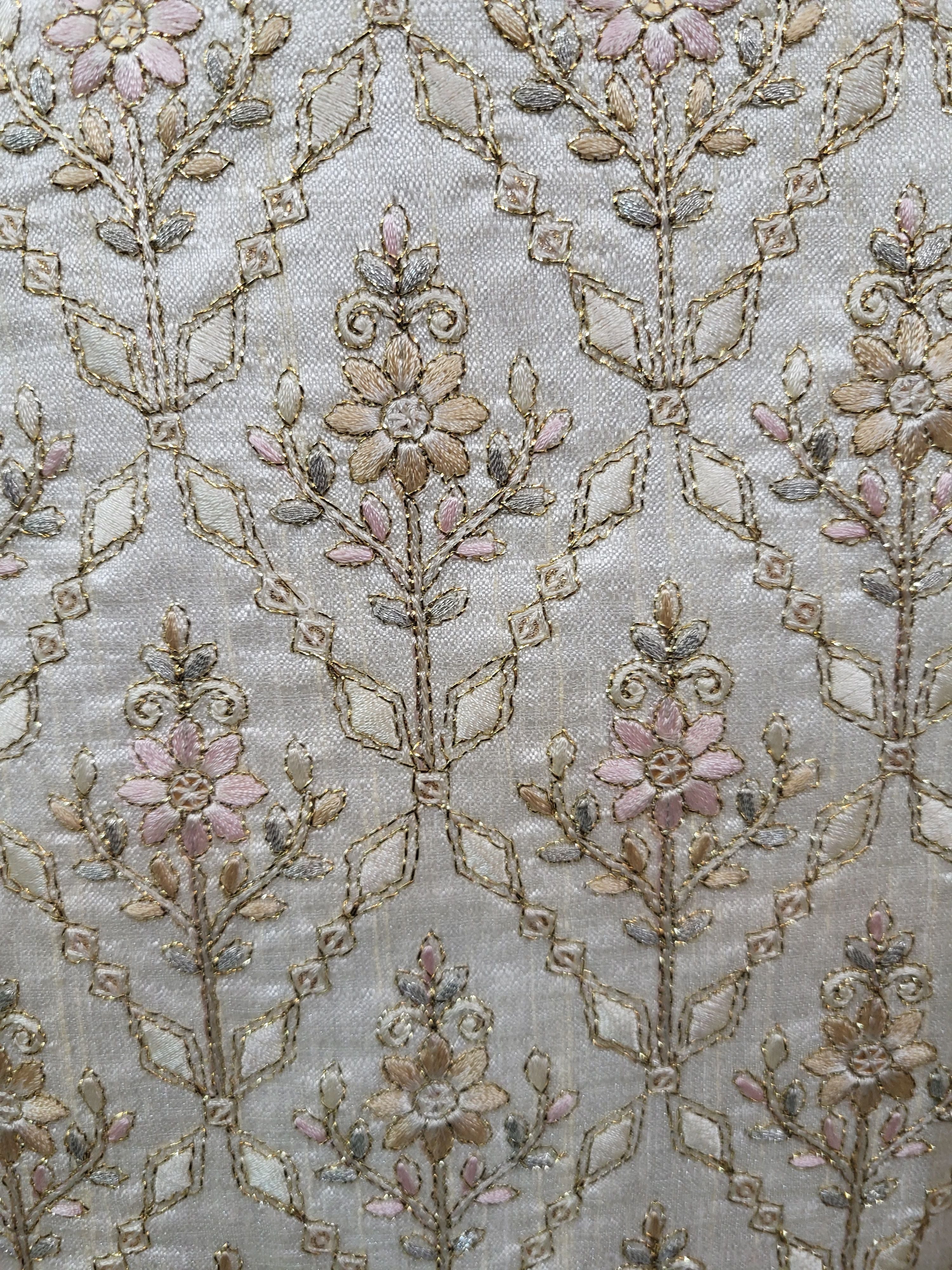 Close-up of intricate floral embroidery on fabric