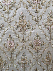 Close-up of intricate floral embroidery on fabric