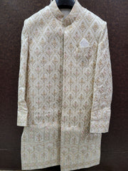 Traditional embroidered sherwani on a dark background