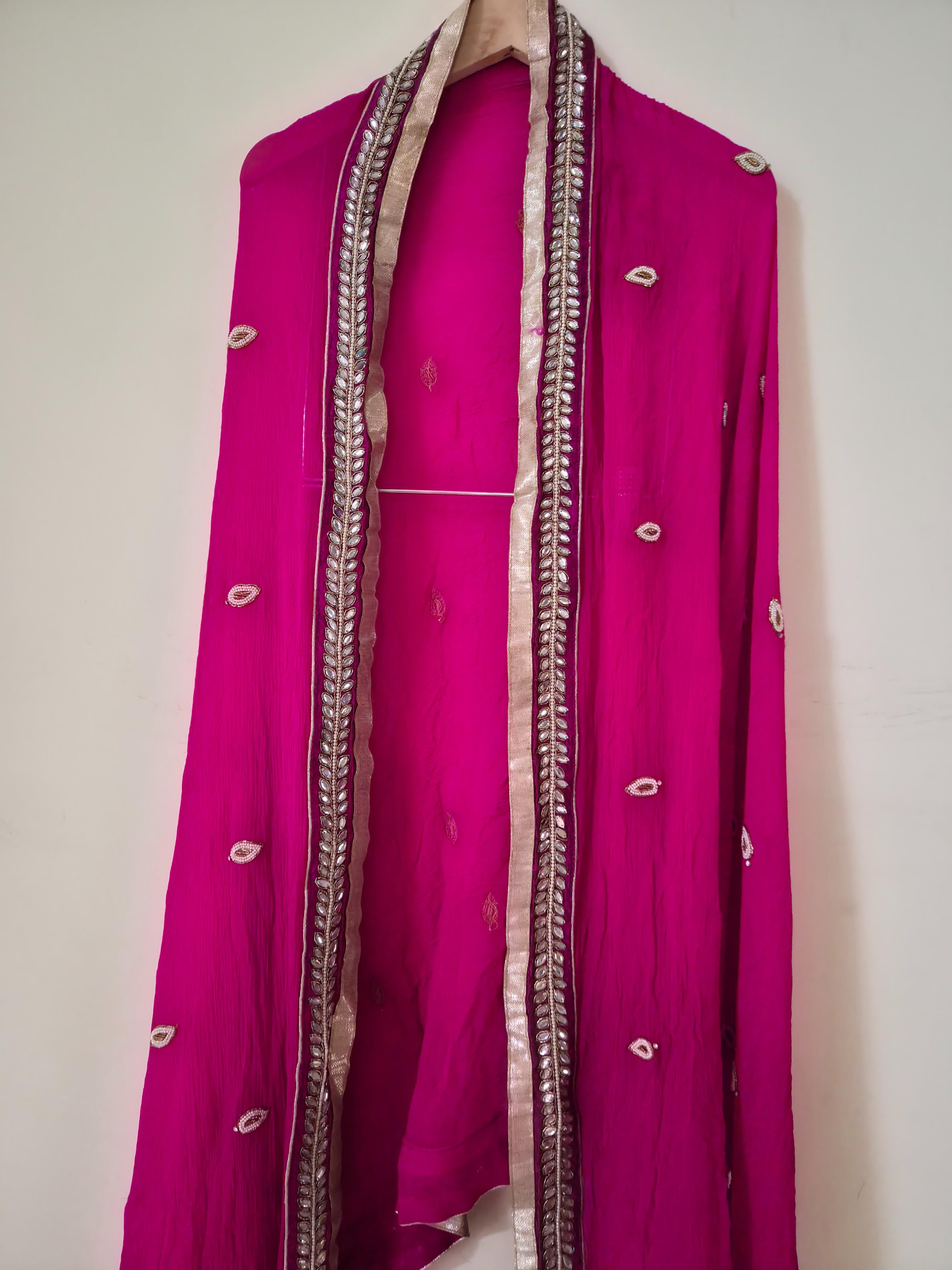 Pink dupatta on a plain background