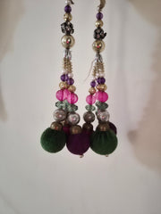 Colorful beaded latkans on a white background