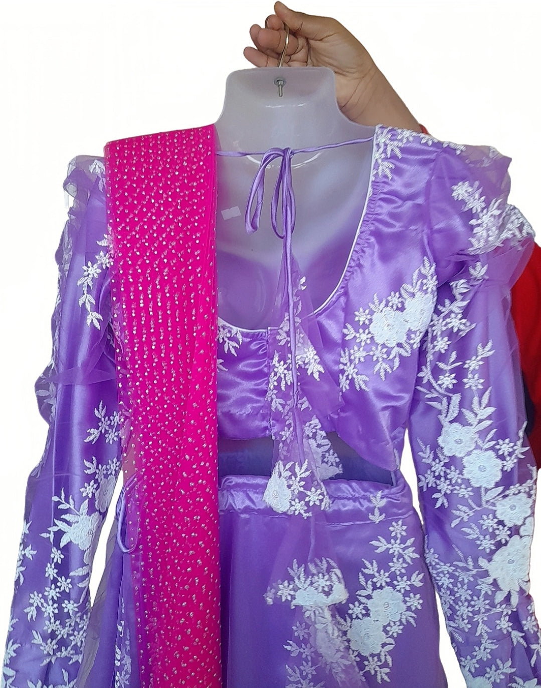 Purple floral dress with pink dupatta on a mannequin against a white background