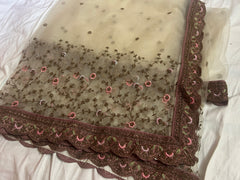 Embroidered dupatta with floral patterns on a white background