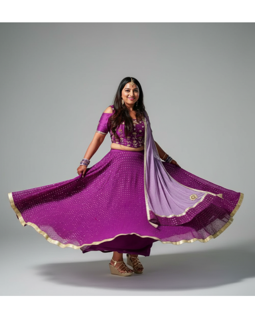 Woman in a purple lehenga with a flowing skirt on a gray background