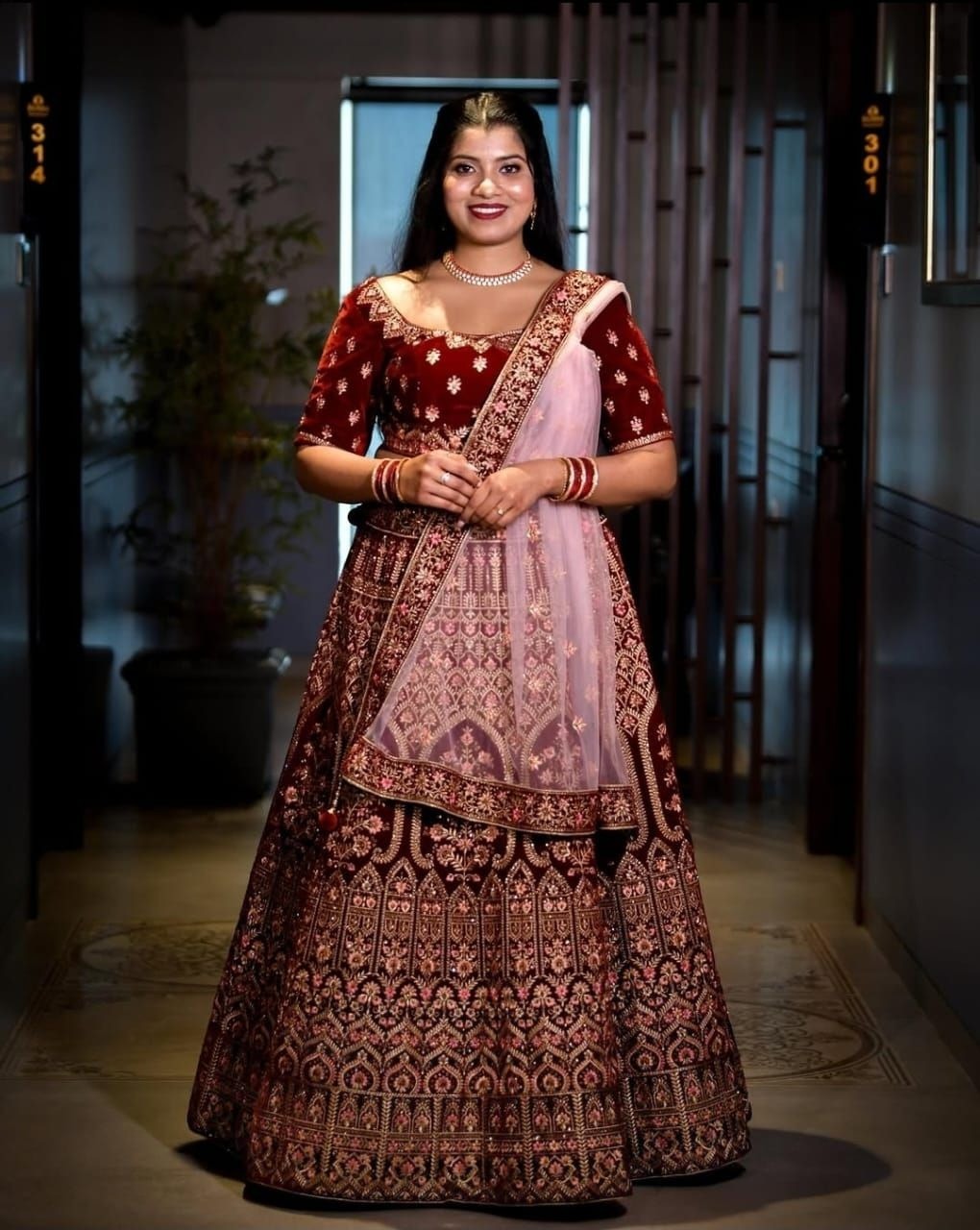 Manyavar Mohey Maroon Velvet Bridal Lehenga with Pink Dupatta